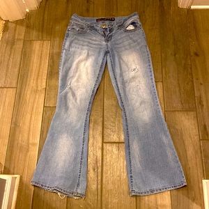 light blue, ripped jeans, low rise, flare